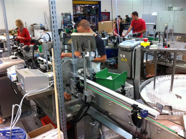 Conditionnement de produits liquides en flacons